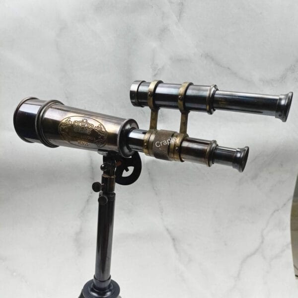 View of the eyepieces for both the main scope and finder scope on the vintage-style telescope.