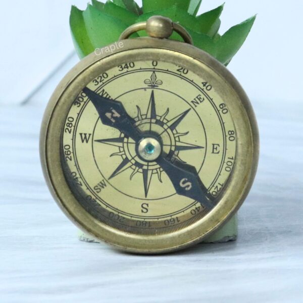 London New York Sydney Compass-1 Vintage-style "Regal Brand" pocket compass with a polished brass casing and a detailed antique compass rose dial.