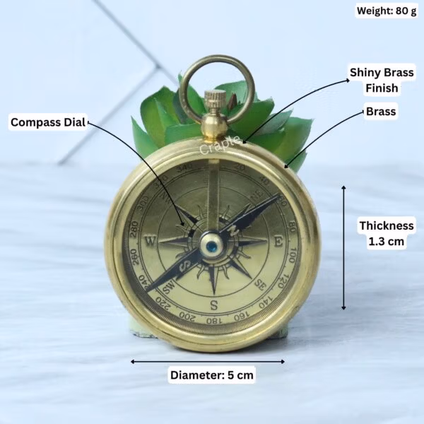Brass pocket compass with its specifications labeled: 5 cm diameter, 1.3 cm thickness, and 80g weight.
