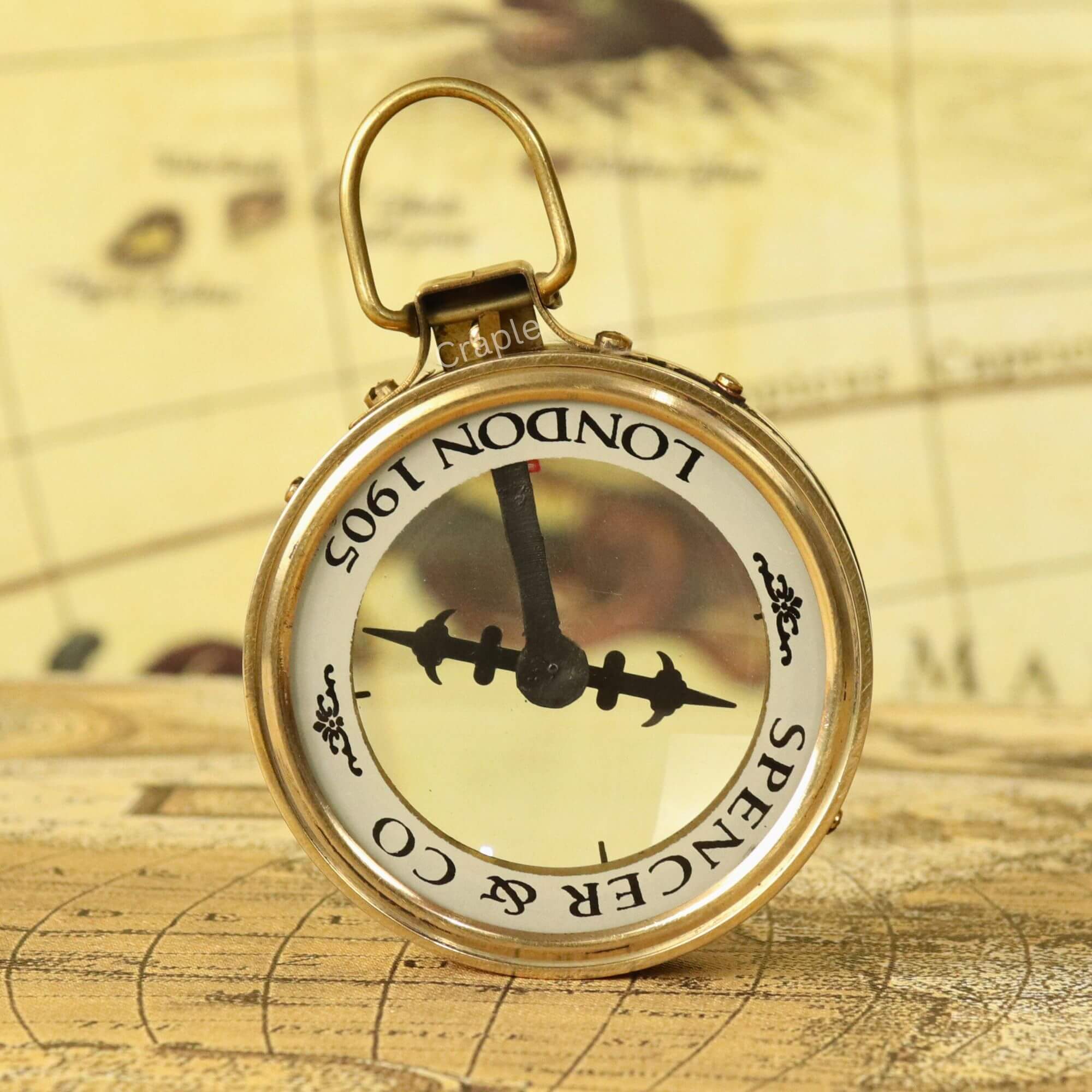 Magnifying Map Reader Spencer Compass-1 Vintage-style Spencer & Co. London 1905 magnifying map reader compass with a polished brass casing and ornate floating dial.