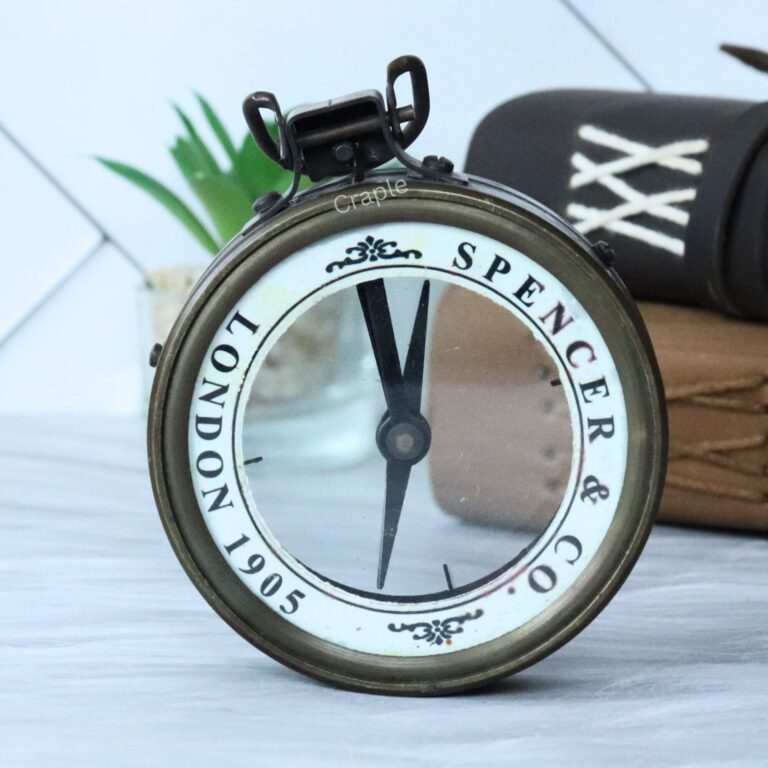 Vintage Spencer & Co. London map reader compass with a magnifying glass lens and an antique brass finish.