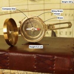Brass Brunton compass with its specifications labeled, showing a height of 6.3 cm and a weight of 180g.