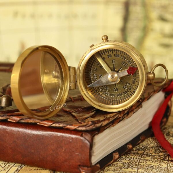 Shiny Brass Pocket Compass with Mirror-4 Vintage-style brass pocket compass with an integrated mirror in the lid, opened to show the detailed compass face.
