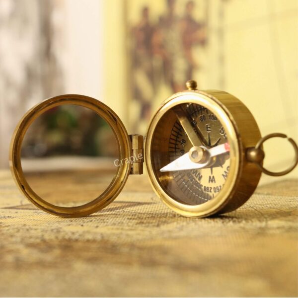 Shiny Brass Pocket Compass with Mirror-5 The brass pocket compass opened flat to display both the classic dial and the clear, round mirror side-by-side.