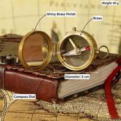Brass pocket compass with mirror, with its dimensions labeled: 5 cm diameter and 85g weight.