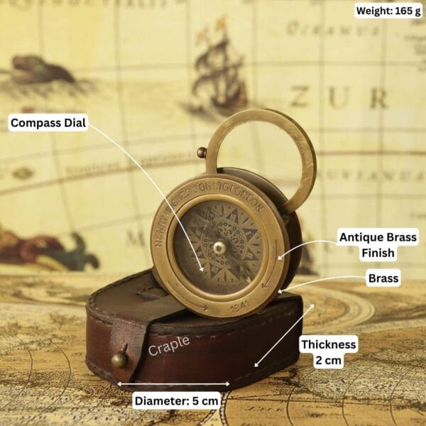 Brass sliding magnifier compass with its dimensions labeled: 5 cm diameter, 2 cm thickness, and 165g weight.