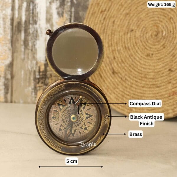 Sliding magnifier brass desk compass with dimensions and materials labeled: 5 cm diameter and 165g weight.