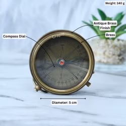 Stanley London pocket compass with its dimensions labeled, showing a 5 cm diameter and 140g weight.