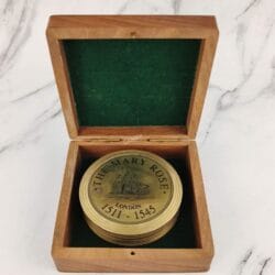 "The Mary Rose" brass sundial compass nestled inside its green felt-lined wooden presentation box.