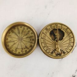 The two interior faces of the Mary Rose sundial compass, showing the sundial gnomon and the perpetual calendar.