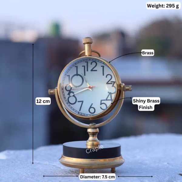 Product image of the brass orb clock with dimensions: 12 cm height, 7.5 cm diameter, and 295g weight.