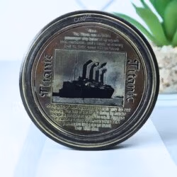 Compact and solid, this collectible compass measures 5 cm in diameter, perfect for display.