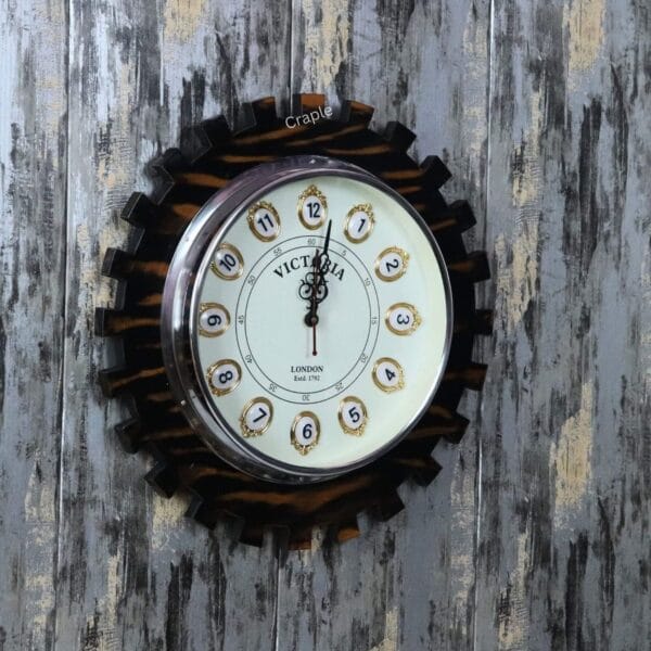 A side perspective of the large wooden cog-shaped clock, highlighting the contrast between the wood frame and the clock face.