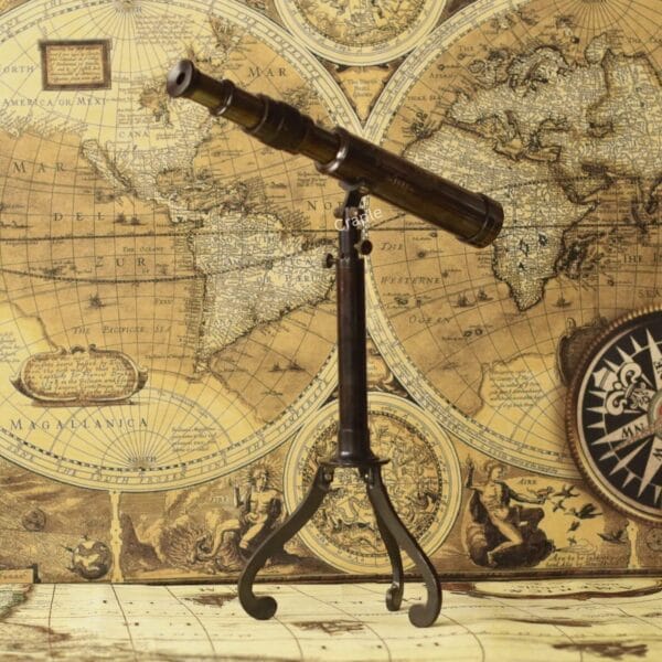 W. Ottway Stand Brass Telescope-1 Vintage W. Ottway brass telescope with a black antique finish, mounted on a decorative foldable tripod stand.
