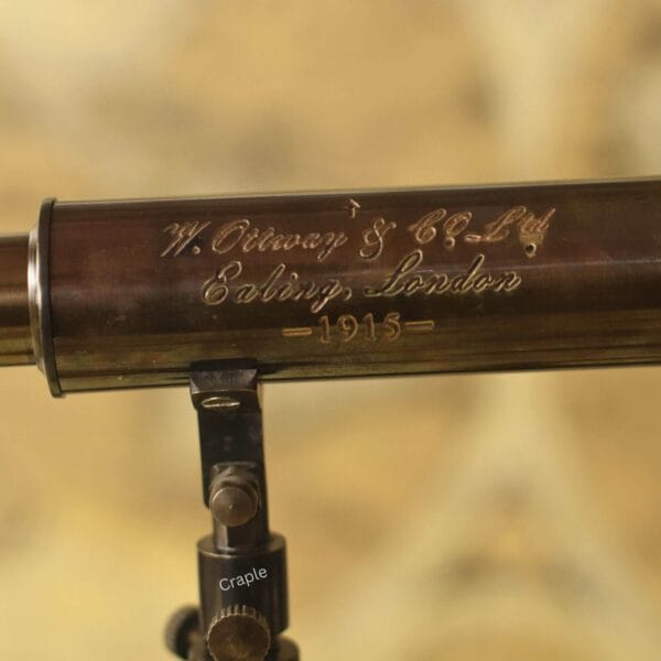 Detailed close-up showing the "W. Ottway & Co Ld, Ealing, London - 1915" engraving on the brass telescope barrel.