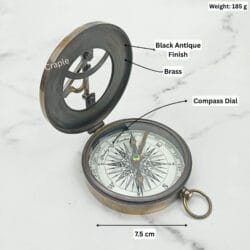 Black antique sundial compass labeled with its dimensions, showing a 7.5 cm diameter and 185g weight.