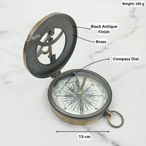 Black antique sundial compass labeled with its dimensions, showing a 7.5 cm diameter and 185g weight.