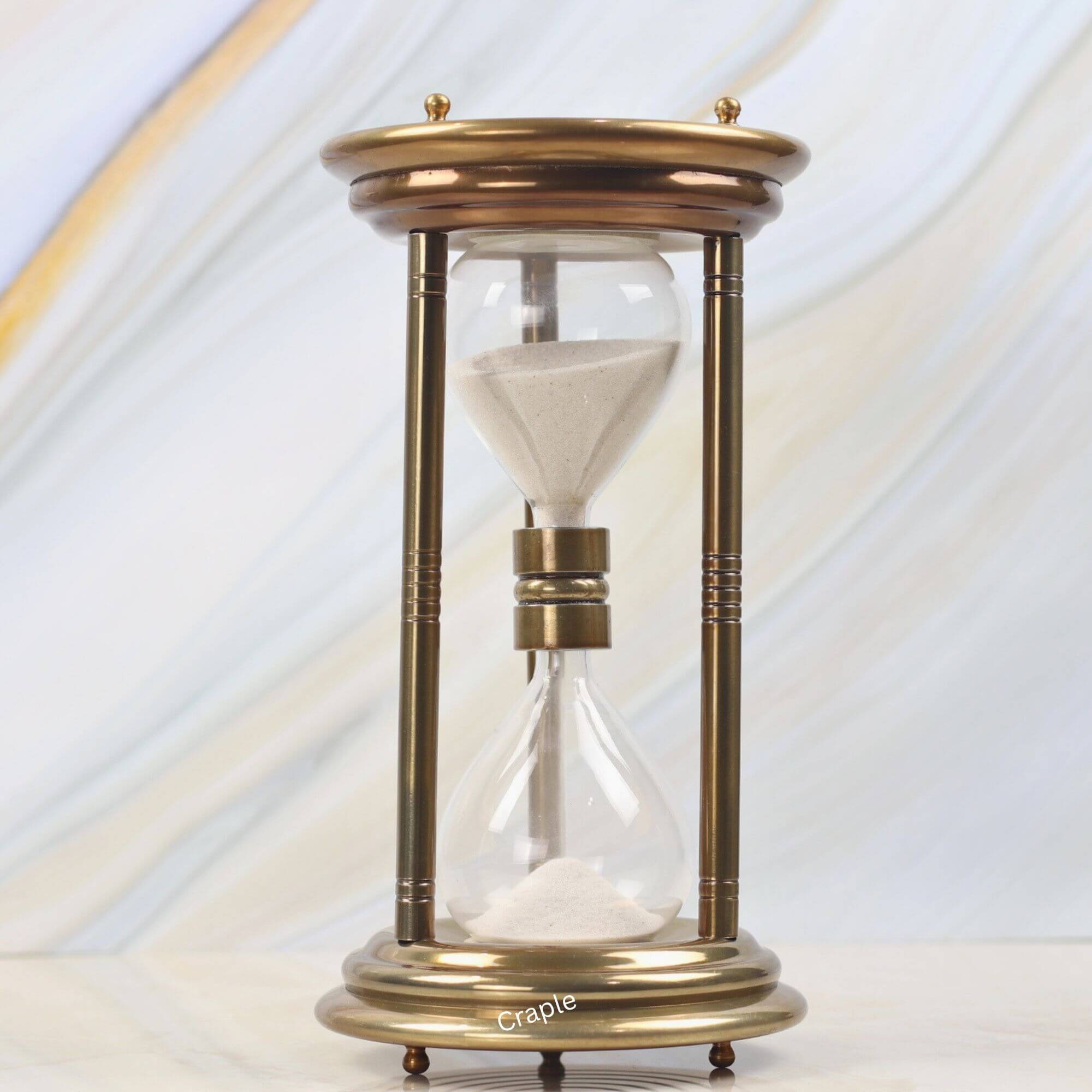 1 Hour Vintage Antique Steel Hourglass-1 Large vintage-style 5-minute hourglass with a shiny brass finish, steel pillars, and white sand.