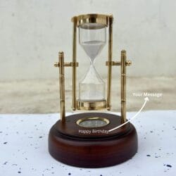 A front view of the 3-minute white sand hourglass, highlighting the engravable polished wooden base.