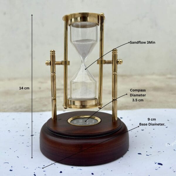 The brass hourglass with its dimensions labeled, showing a height of 14 cm and a compass diameter of 3.5 cm.