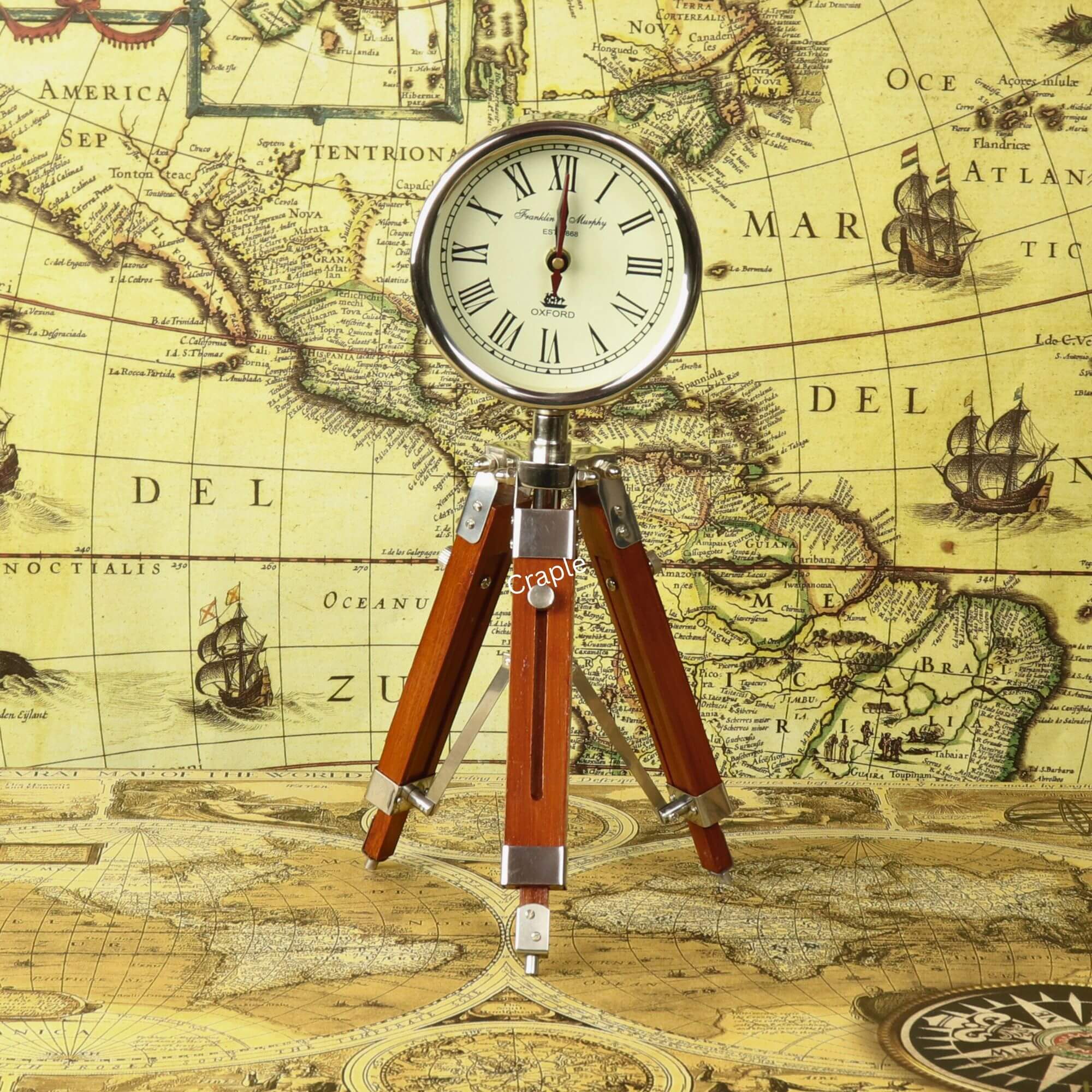 Adjustable Tripod Desk Clock-1 A vintage-style desk clock with a nickel finish and Roman numerals, mounted on an adjustable wooden tripod stand.