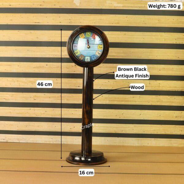 Wooden pedestal clock with its dimensions labeled: 46 cm height, 16 cm base width, and 780g weight.