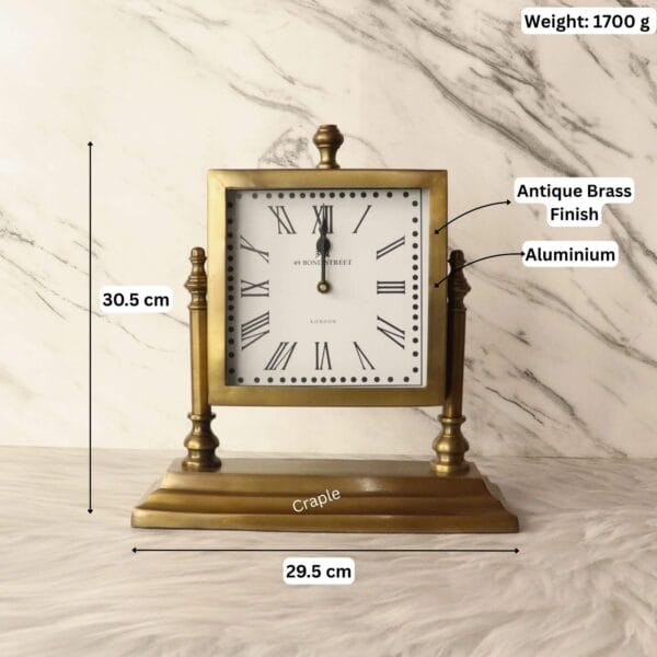 Antique brass table clock with its dimensions labeled, showing a height of 30.5 cm and a width of 29.5 cm.