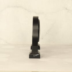 Black wooden desk clock with its dimensions labeled, showing a width of 26 cm and a height of 17 cm.
