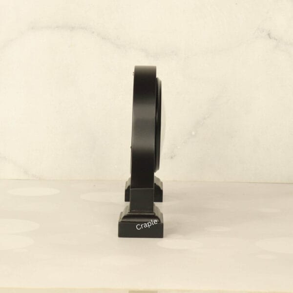 Black wooden desk clock with its dimensions labeled, showing a width of 26 cm and a height of 17 cm.