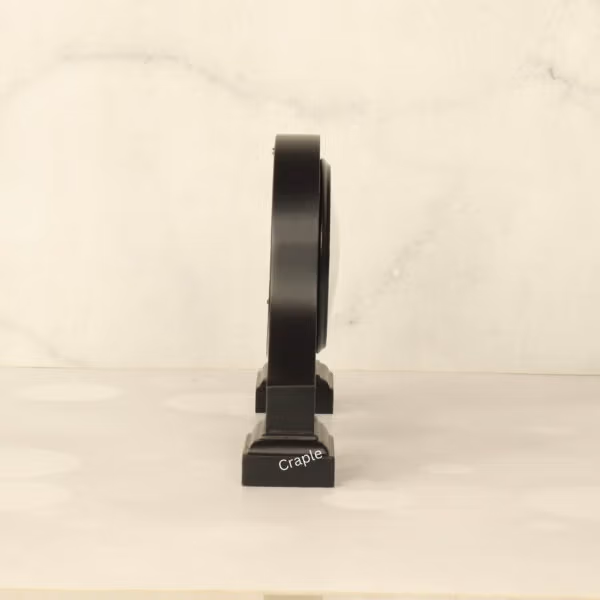 Black wooden desk clock with its dimensions labeled, showing a width of 26 cm and a height of 17 cm.