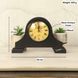 Black wooden desk clock with its dimensions labeled, showing a width of 26 cm and a height of 17 cm.