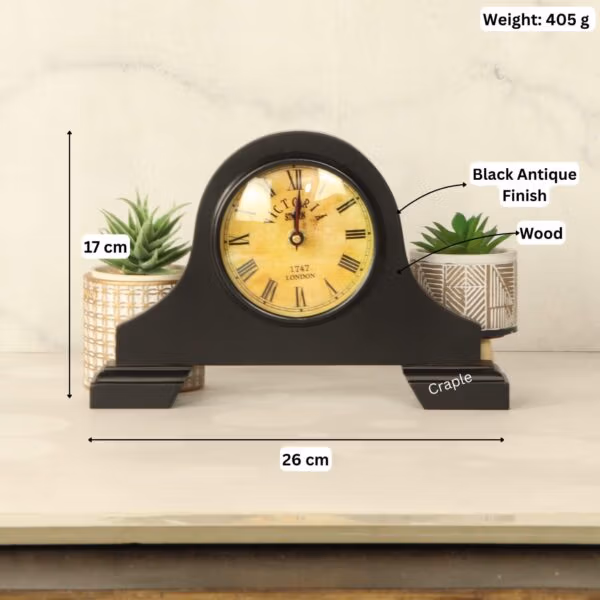 Black wooden desk clock with its dimensions labeled, showing a width of 26 cm and a height of 17 cm.