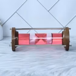 A straight-on horizontal view of the liquid hourglass, displaying the internal timer mechanism clearly.