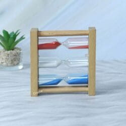 Side profile of the 3-in-1 wooden hourglass, showing its slim and compact design.